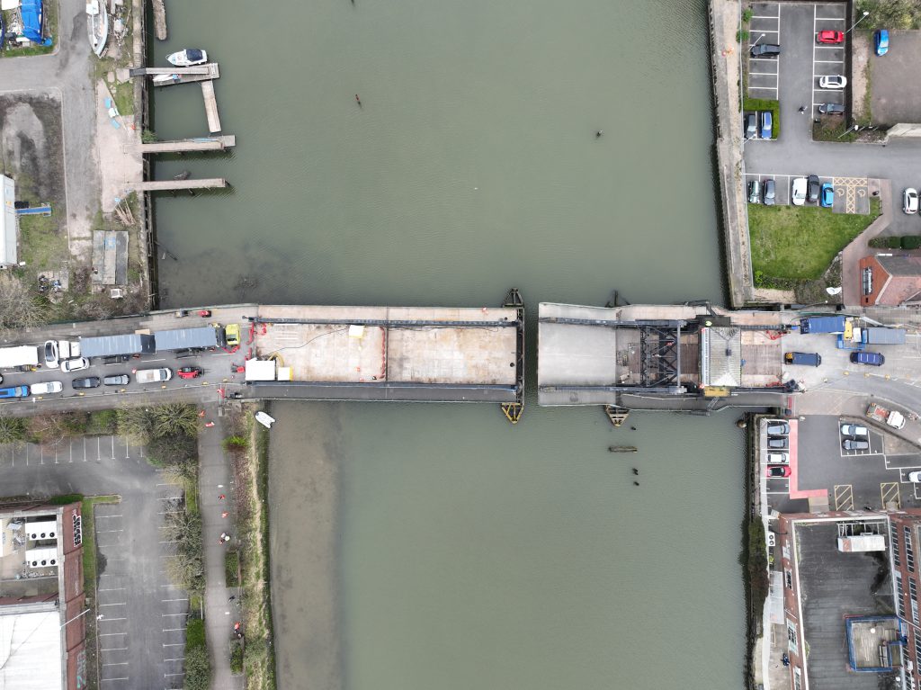 Drone shot of Corporation Bridge being lifted.