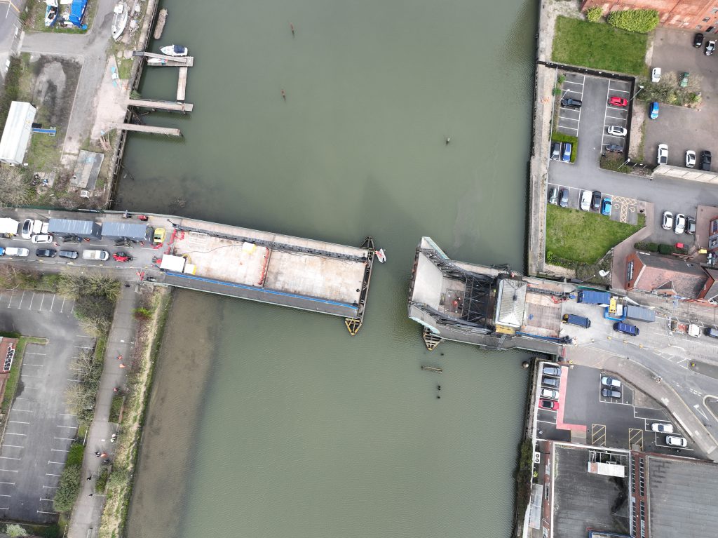 Drone shot of Corporation Bridge being lifted.