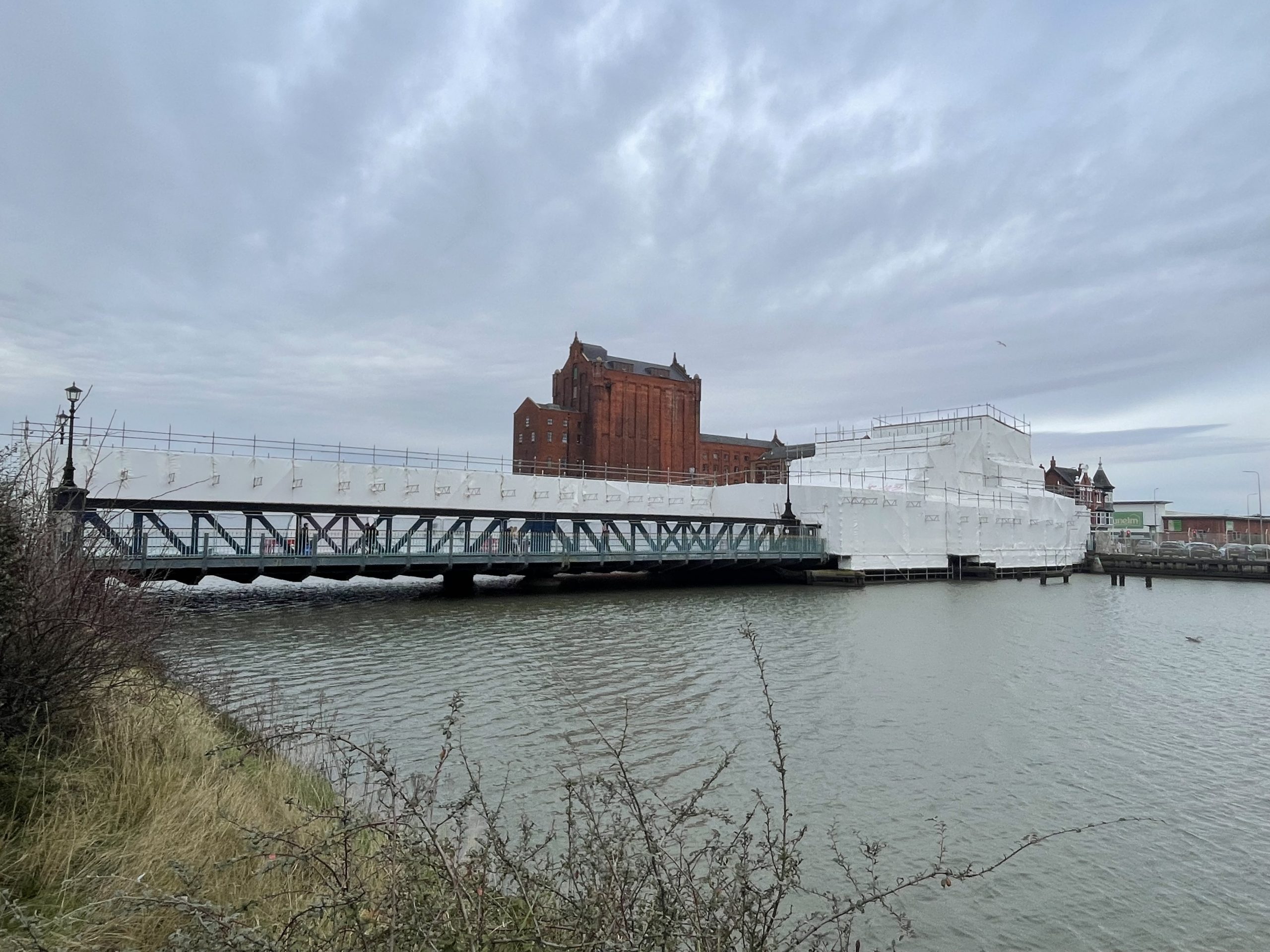 A photo of Corporation Road Bridge taken from a nearby wharf